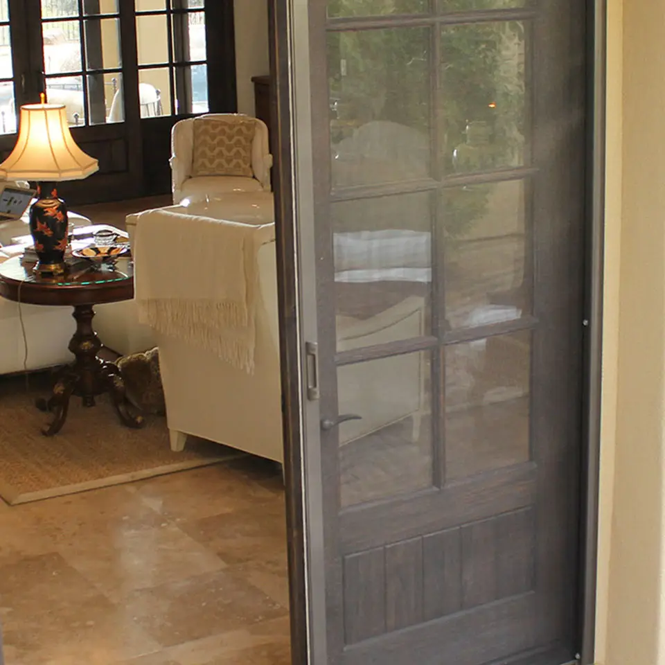 Photo of screen door on a double door