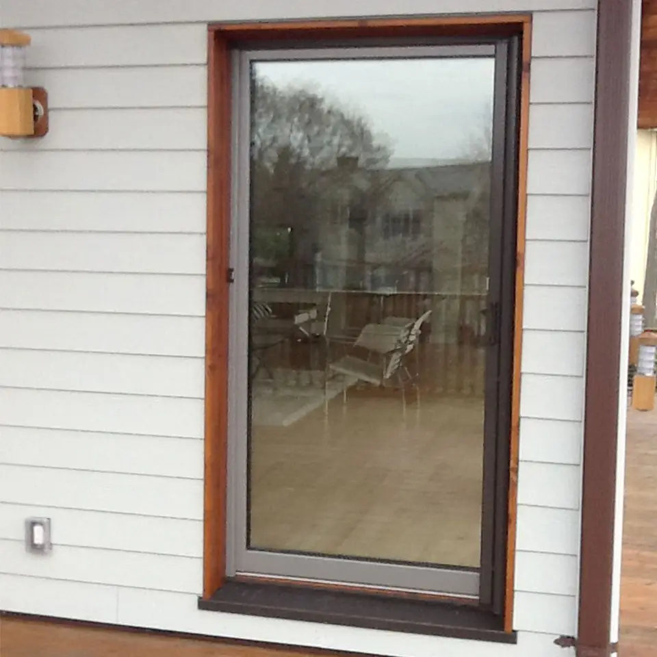 Photo of screen door on a single door