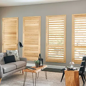 Window shades on gray wall