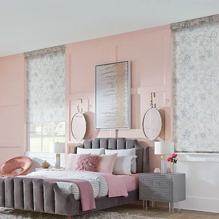 Pink bedroom with custom blinds containing able and gray floral pattern